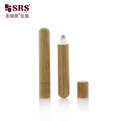 comprar Bajo redondo Bottles de aceite esencial con rodillos de acero sin fugas botellas de bambú natural de vidrio online manufacture