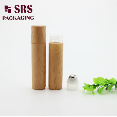 comprar rollo de plástico personalizado en bola de metal agua vacía impresa sin fugas botella de suero capilar online manufacture
