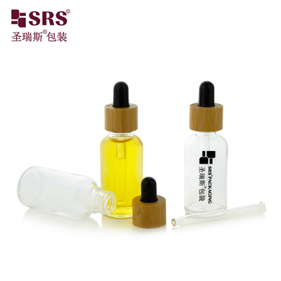 1 oz de vidrio transparente y vacío Aceite esencial de lujo de bambú botella de goteo para el hombro 30 ml