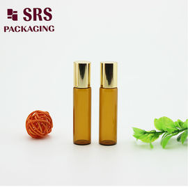 Botella de 5 ml de cristal de cristal ámbar de lujo con bola de metal para aceite esencial