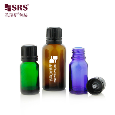 G006 Botella de vidrio redonda de Boston Tamer con tapa TE transparente con inserción de goteador horizontal para aceite esencial